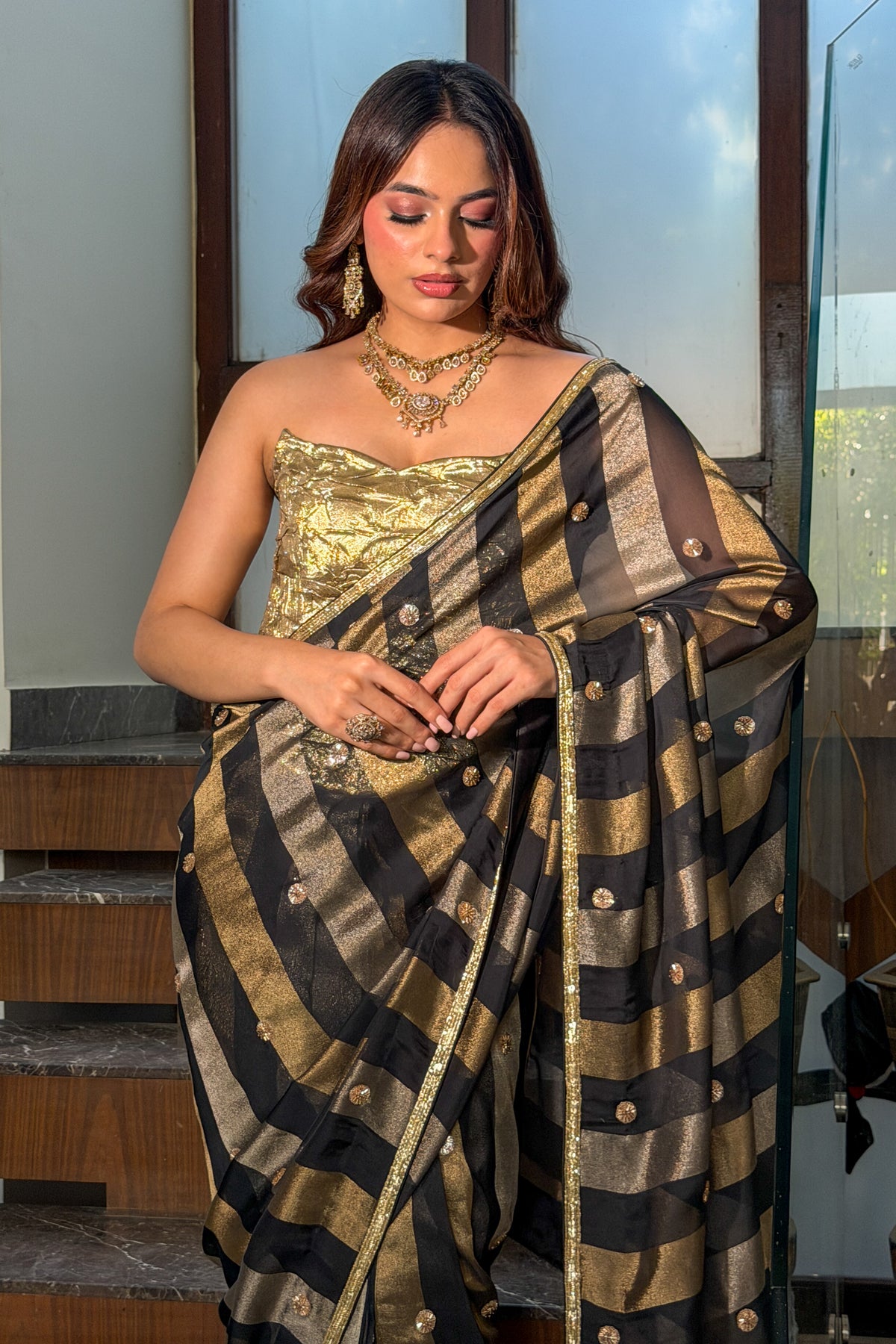 Black and Gold Striped Saree with Gold Foil Corset